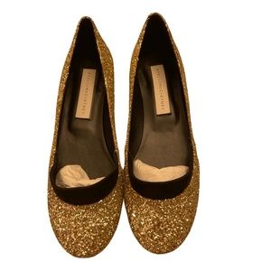 Stella McCartney gold glitter flat shoes